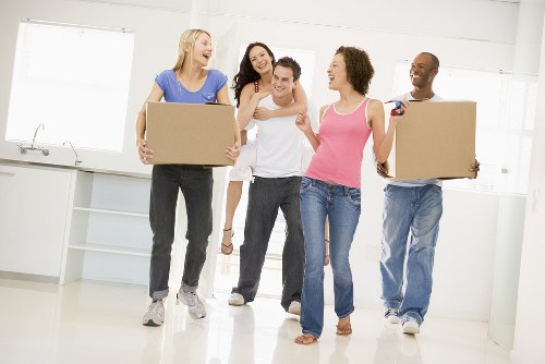 Removal team preparing a house move in Harringay with boxes and furniture