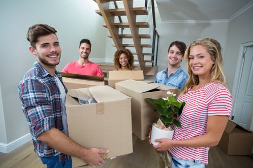 Removal van and packed boxes for a Harringay home move