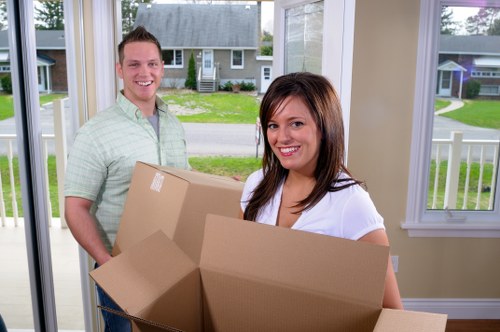 Local movers handling flat removals on a Harringay street