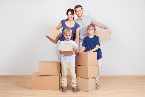 Professional movers assisting with office relocation in Harringay