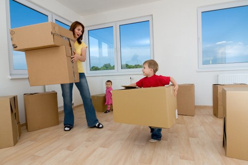 Local movers organising boxes in a Harringay flat