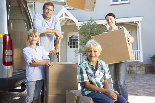 Unpacking boxes in a Harringay property after a move