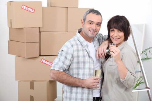 Furniture being carried through a typical Harringay property
